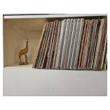 Vinyl Records & Decorative Giraffe Figure