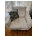 White Upholstered Armchair with Accent Pillow