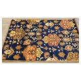 5ft x 8ft Area Rug with Floral Motif