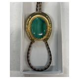 Bolo tie with green stone