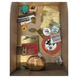 Smoky the bear badge, model T brass tags, etc.