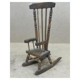 Hand carved wooden rocker