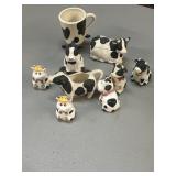 Cow salt and pepper, shakers creamer, and sugars
