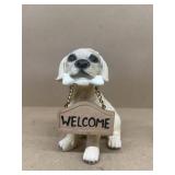 Dog with welcome sign