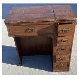 Sewing machine cabinet