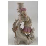 Figural candlestick, porcelain, featuring a woman