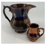 Antique Copper Lusterware pitchers, blue bands wit
