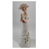 Enesco porcelain figurine, 9.5ï¿½ tall.