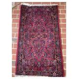 Rug; Antique Persian Sarouk rug, 5 feet x 34.5"