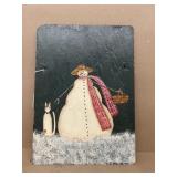 Painting a snowman on slate