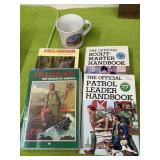 Boy Scout books and coffee mug