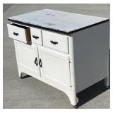 Kitchen cabinet with enamel top