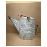 Galvanized watering can
