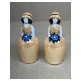 Porcelain girl holding flower salt and pepper