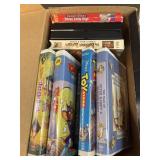 VHS movies, including jungle book and Toy story
