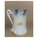 Hand painted Germany water pitcher does have crack