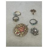 Costume, jewelry rings and broaches