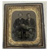 Tintype antique photo of two men sitting in chairs