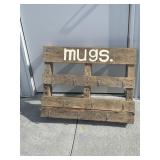 Wooden skid made to hang mugs