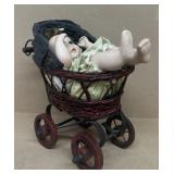 Baby carriage with doll porcelain