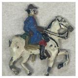 Metal soldier on horse