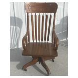Early wooden swivel chair