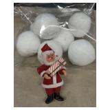 Celluloid Santa Claus 5 1/4 inches with moving