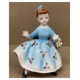 Porcelain girl carrying basket figurine 5 1/2