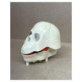 Wind up chattering skull