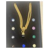 Joan Rivers pendant with multi beads
