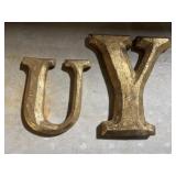 Gold letters U Y