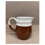 Brown and white stoneware pitcher