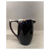 Brown stoneware pitcher