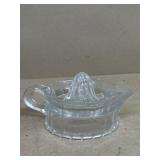 Clear, glass juice squeezer