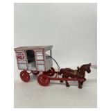 Cast iron horse draw milk wagon