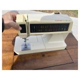 Singer, sewing machine cabinet and content