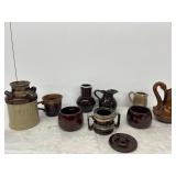 Brown stoneware cups, creamers