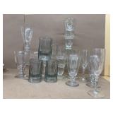 Clear glass goblet, and root beer mug