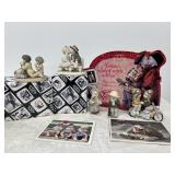 Kim Anderson figurines with cardboard display sign