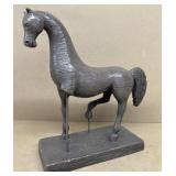 Horse sculpture missing one leg