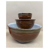 Brown hand, painted stackable bowls