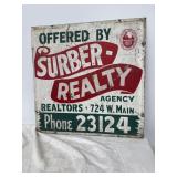 SUBER Realty metal sign