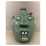 Snake face jug
