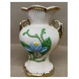 Hull pottery magnolia with gold trim vase