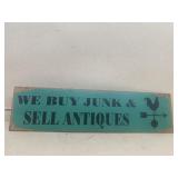 We buy junk and sell antique sign metal