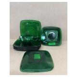 Green glass saucers,plates and cup
