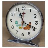 Alarm clock with chicken