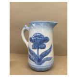Stoneware water pitcher with flower