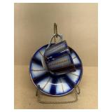 Flow blue tea, cup, and saucer with holder