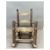 Wicker seated doll chair